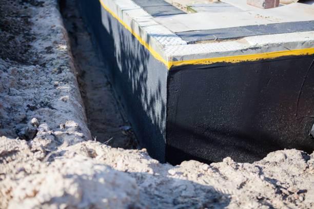 Professional Waterproofing technician working in Lawrenceburg, TN